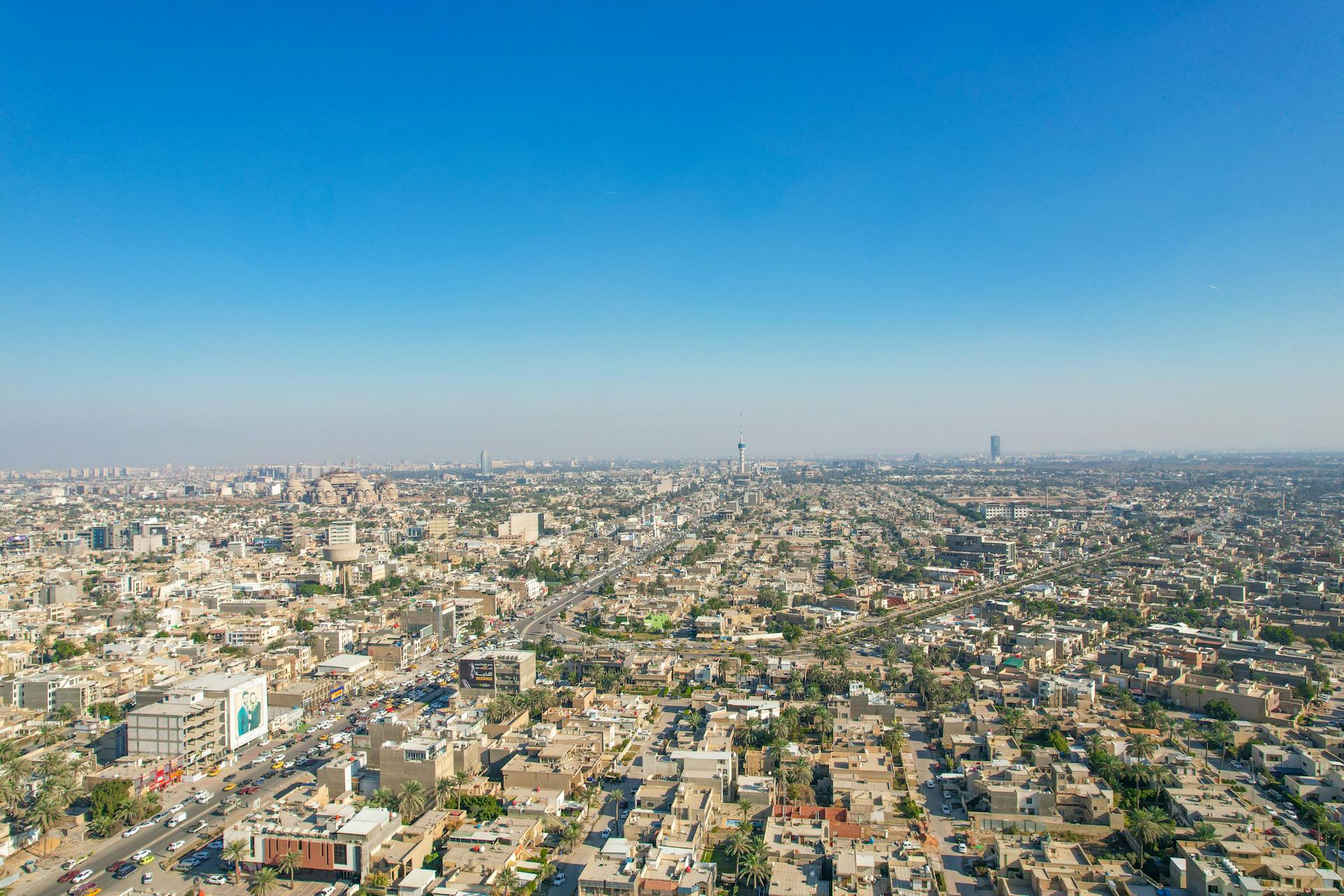 Skyline view of the city with residential and commercial buildings, representing Rixent's global risk advisory services.